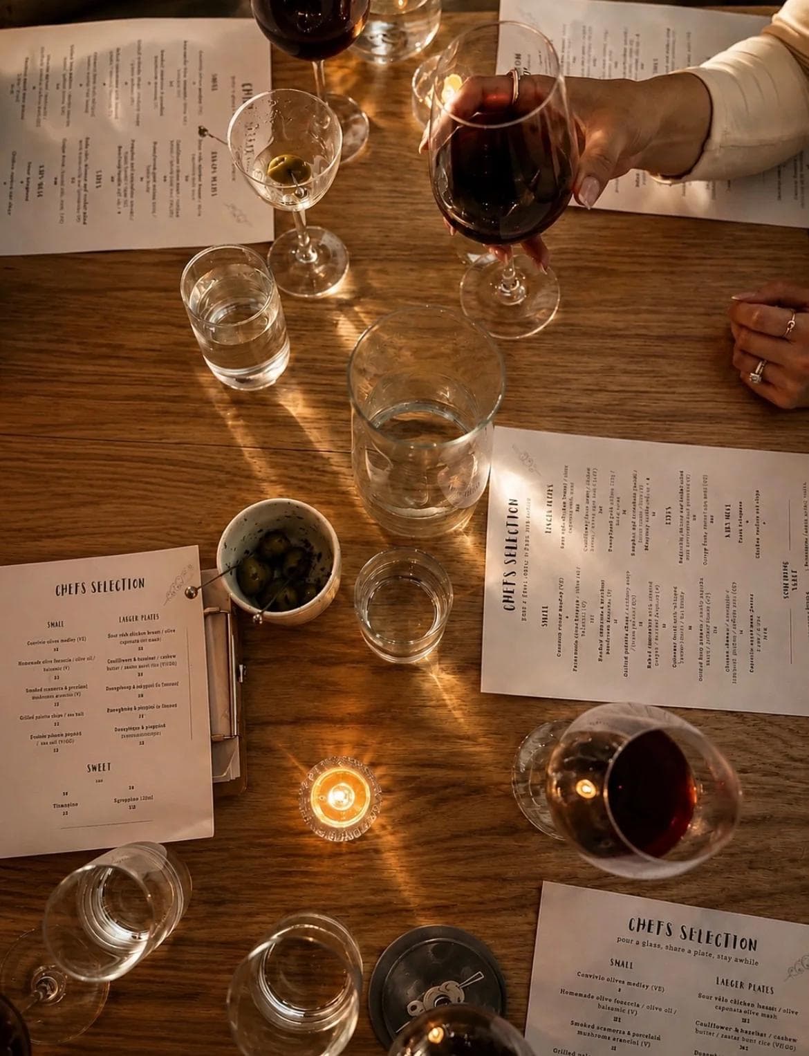 A table set for food and wine at Convivio